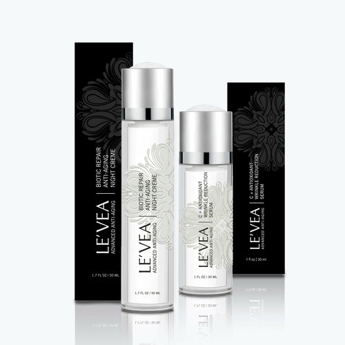 LE'VEA Age Perfect 2pc Anti-Aging Treatment: Night Repair Cream and Vitamin C Serum packaging on a clean background.