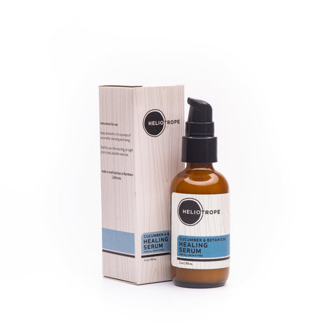 Cucumber & Botanical Healing Serum bottle and packaging on a white background, designed for soothing dry and irritated skin.